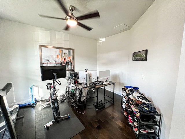 interior space with ceiling fan and dark hardwood / wood-style floors