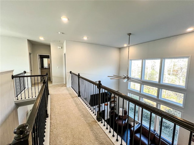 corridor featuring carpet floors