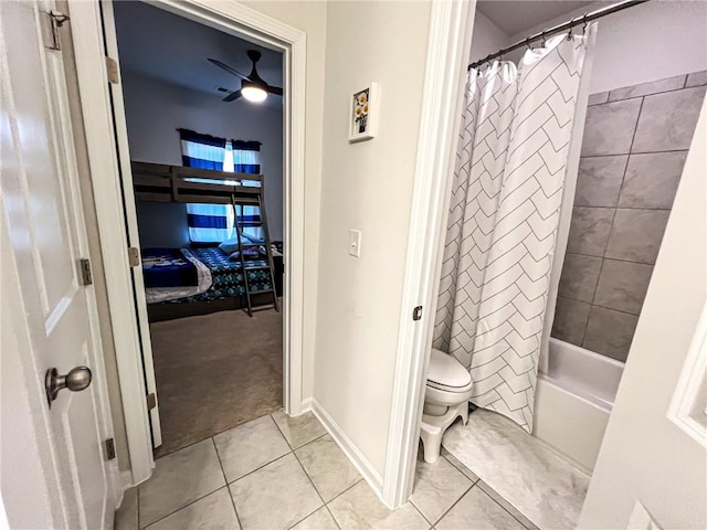 bathroom with tile patterned flooring, shower / bath combination with curtain, toilet, and ceiling fan