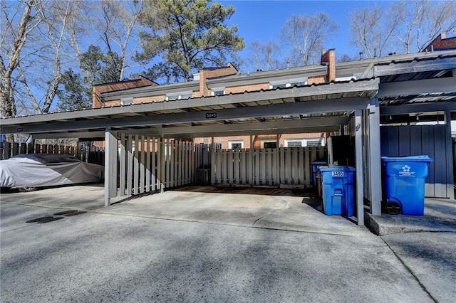 garage featuring a carport