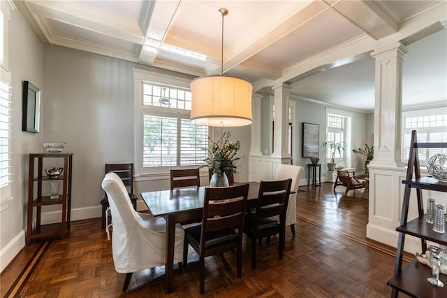 dining area featuring baseboards, beamed ceiling, coffered ceiling, and ornate columns