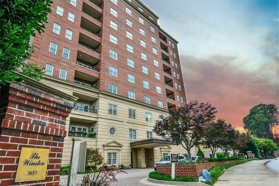3657 Peachtree Rd NE Unit 3C, Atlanta, GA 30319 - view of outdoor building at dusk