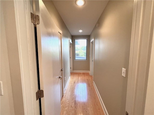 hallway featuring light hardwood / wood-style floors