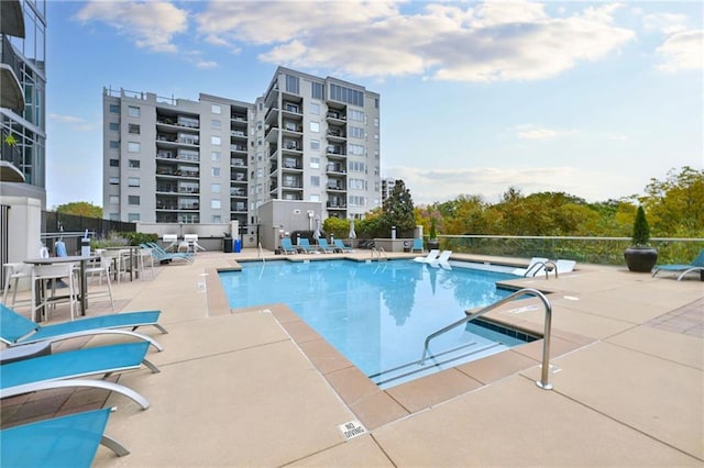 view of swimming pool featuring a patio