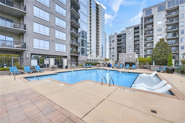 view of pool featuring a patio area