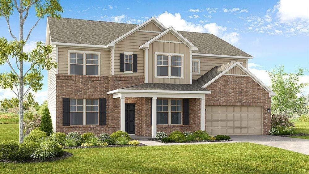 view of front facade featuring a front lawn and a garage