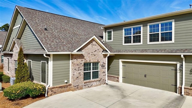 view of exterior entry featuring brick siding