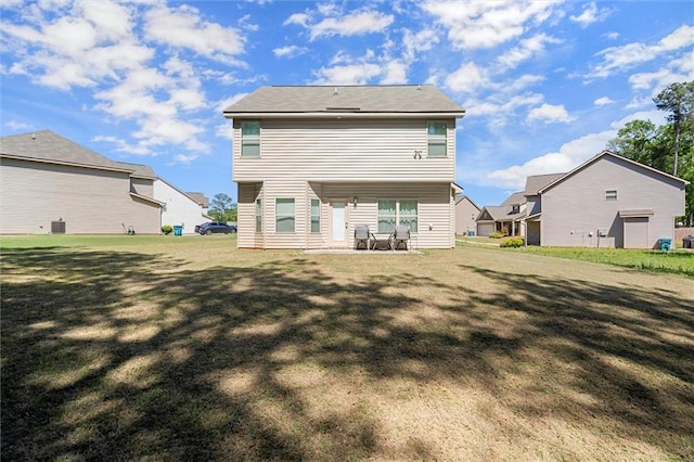 106 Thurman Ct, Jackson, GA 30233 - back of property with a lawn, a patio area, and a residential view