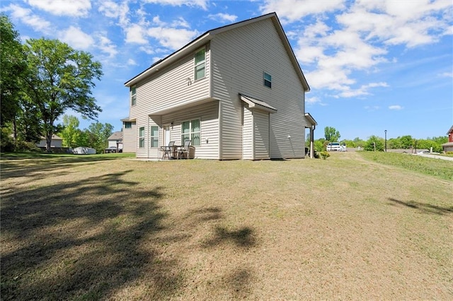 106 Thurman Ct, Jackson, GA 30233 - rear view of property with a lawn