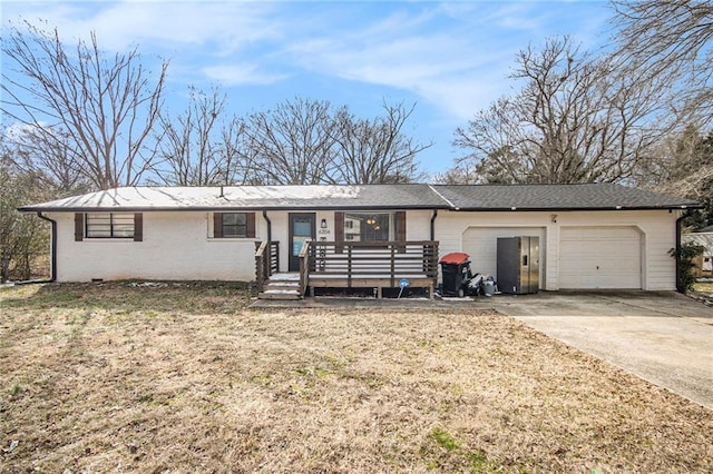 ranch-style house featuring a garage