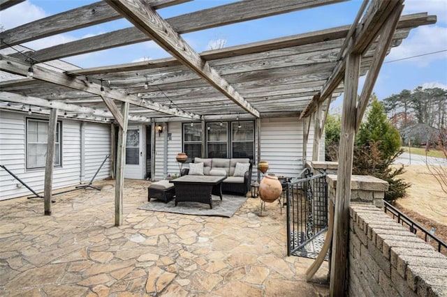 view of patio / terrace featuring outdoor lounge area and a pergola