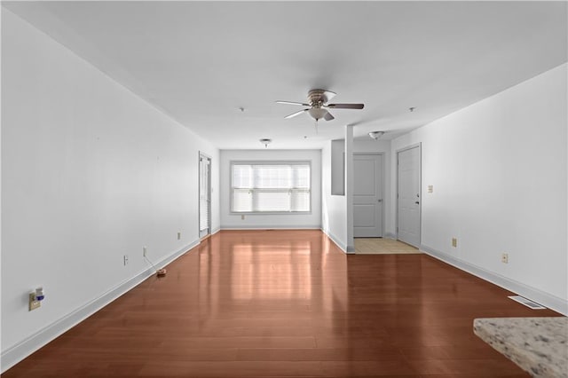 spare room with ceiling fan and light hardwood / wood-style floors