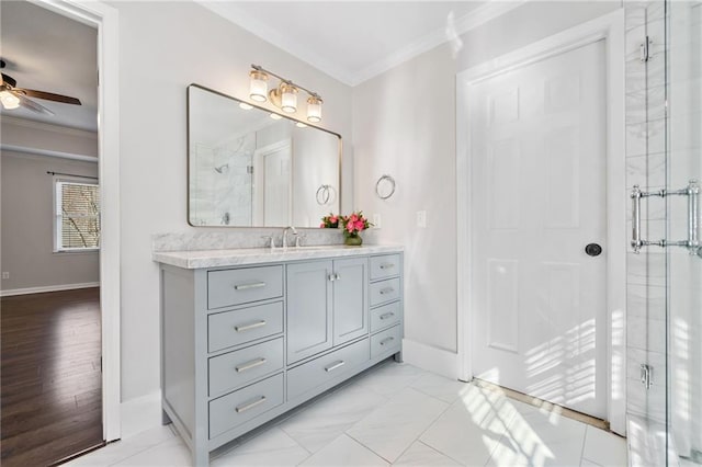 bathroom featuring ceiling fan, a shower stall, vanity, and crown molding