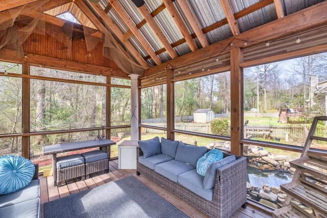 sunroom with vaulted ceiling