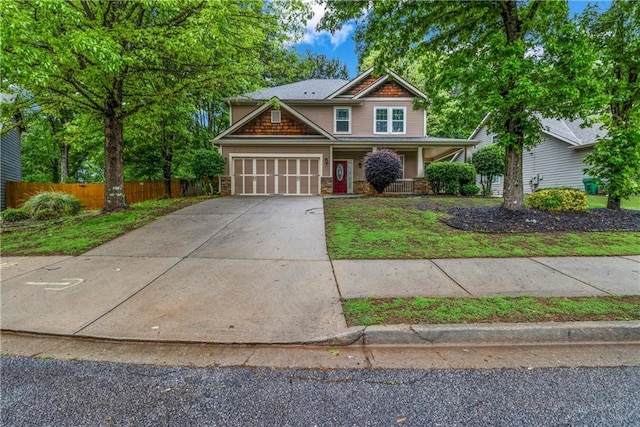 1714 Boulder Walk Ln SE, Atlanta, GA 30316 - craftsman-style house featuring driveway, an attached garage, and covered porch