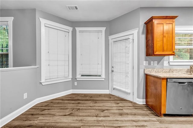 1714 Boulder Walk Ln SE, Atlanta, GA 30316 - unfurnished dining area with wood finished floors, plenty of natural light, and baseboards