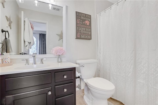 full bath with vanity, toilet, and visible vents