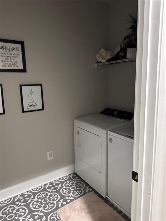 laundry room with independent washer and dryer