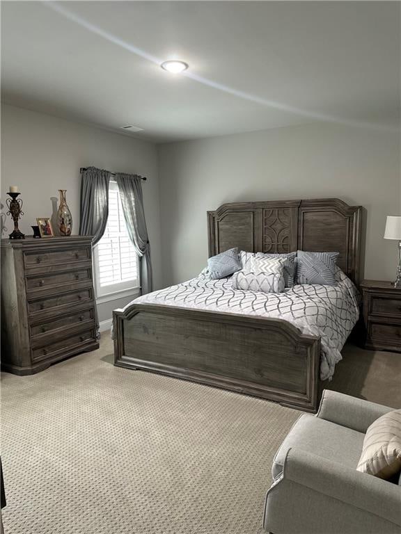 bedroom featuring carpet