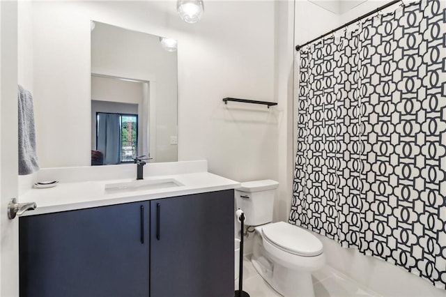 bathroom with vanity, toilet, and a shower with curtain