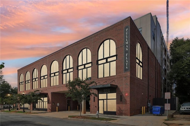 view of property at dusk