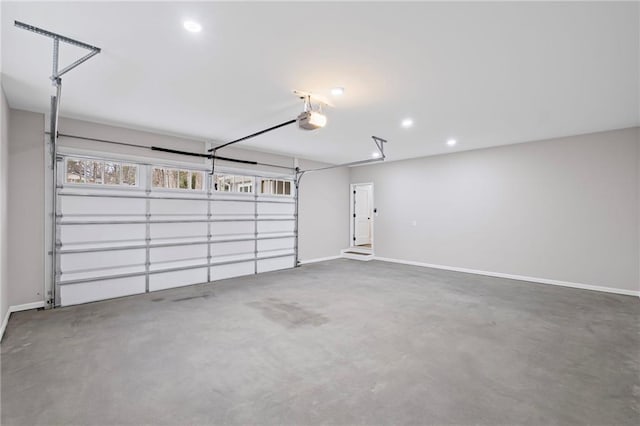 garage featuring baseboards and a garage door opener