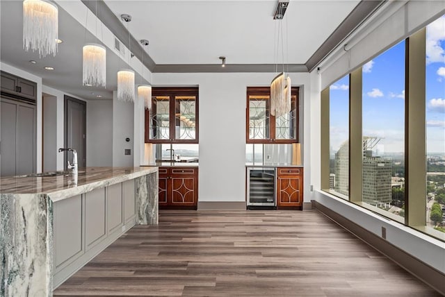 3630 Peachtree Rd NE Unit 2207, Atlanta, GA 30326 - kitchen featuring beverage cooler, dark wood-type flooring, a sink, plenty of natural light, and recessed lighting