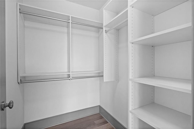 3630 Peachtree Rd NE Unit 2207, Atlanta, GA 30326 - spacious closet featuring dark wood-style floors