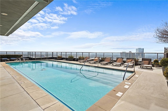 3630 Peachtree Rd NE Unit 2207, Atlanta, GA 30326 - community pool featuring a patio