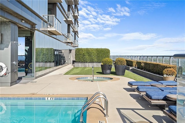 3630 Peachtree Rd NE Unit 2207, Atlanta, GA 30326 - community pool with a patio area and a hot tub