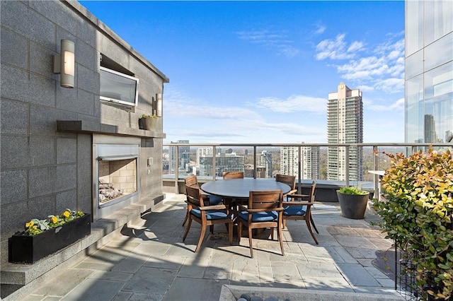 3630 Peachtree Rd NE Unit 2207, Atlanta, GA 30326 - view of patio with a city view and outdoor dining area