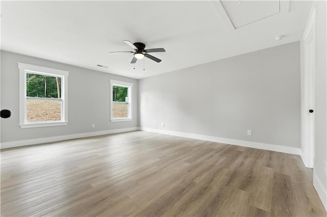 376 Wayside Ln, Dallas, GA 30132 - spare room featuring ceiling fan, light wood-type flooring, a smoke detector, and attic access