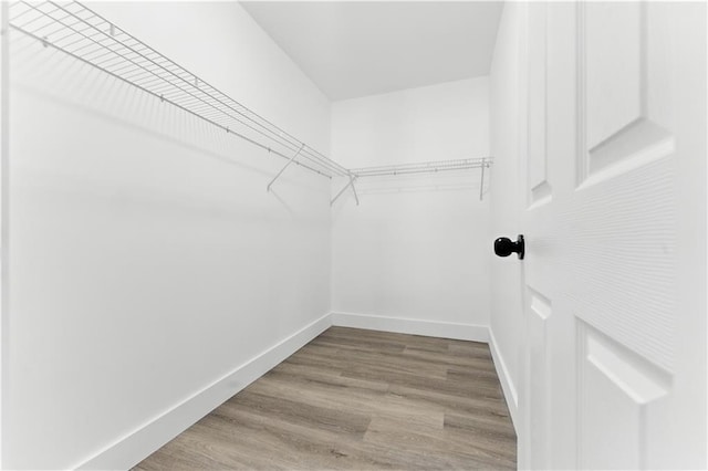 376 Wayside Ln, Dallas, GA 30132 - spacious closet with wood finished floors