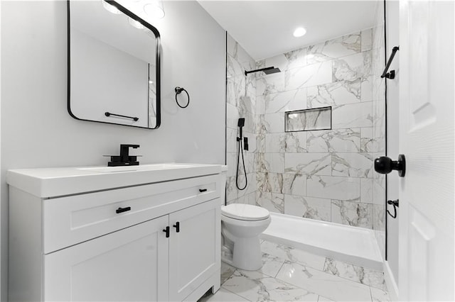376 Wayside Ln, Dallas, GA 30132 - bathroom with marble finish flooring, vanity, a tile shower, and recessed lighting