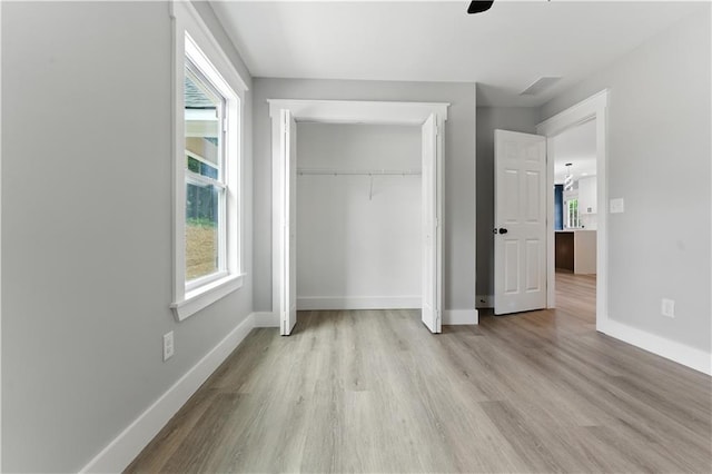 376 Wayside Ln, Dallas, GA 30132 - unfurnished bedroom featuring wood finished floors and a closet