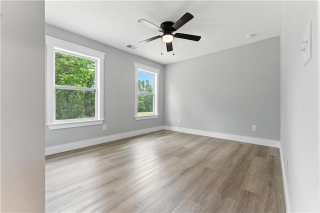 376 Wayside Ln, Dallas, GA 30132 - unfurnished room featuring wood finished floors, a ceiling fan, and a smoke detector