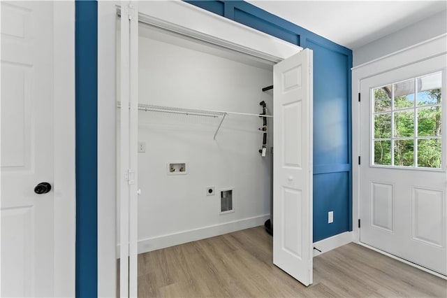 376 Wayside Ln, Dallas, GA 30132 - laundry room with hookup for a washing machine, electric dryer hookup, and light wood-style floors