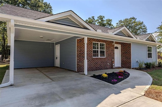 single story home with a carport