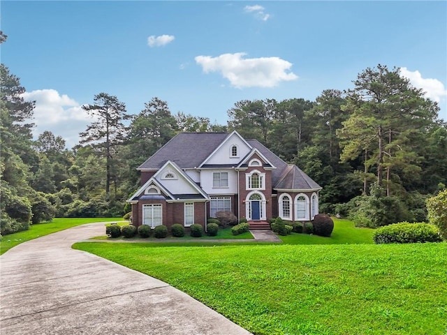 view of front of home with a front lawn