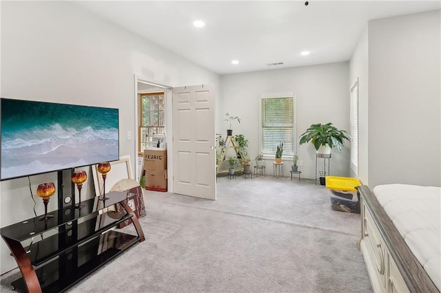 interior space featuring light colored carpet