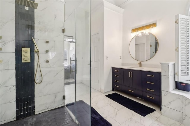 bathroom featuring tiled shower and vanity