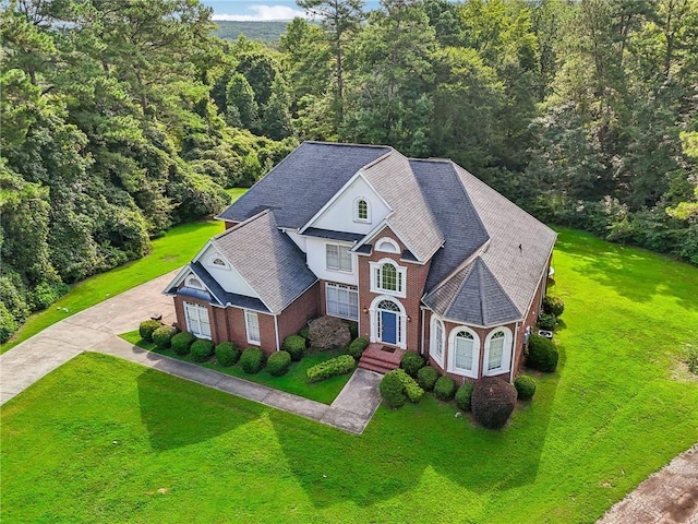 view of front of property with a garage and a front yard