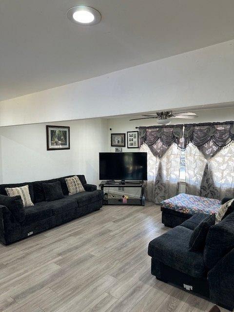 living room with wood finished floors
