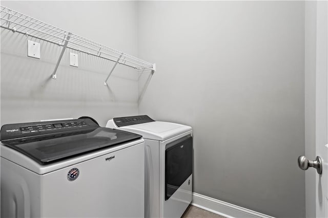 washroom featuring separate washer and dryer