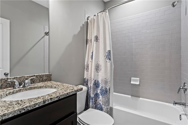 full bathroom with vanity, toilet, and shower / bathtub combination with curtain