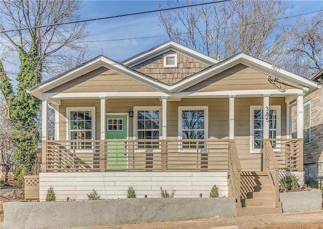 view of front of property featuring covered porch