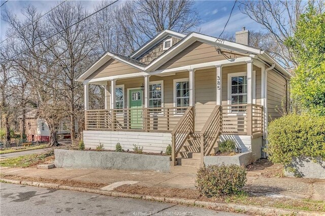 385 Arthur St SW, Atlanta, GA 30310 - bungalow with a porch and a chimney