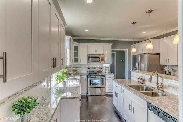 385 Arthur St SW, Atlanta, GA 30310 - kitchen featuring dark wood-type flooring, a sink, white cabinetry, stainless steel appliances, and decorative backsplash