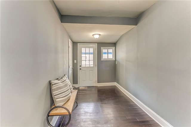385 Arthur St SW, Atlanta, GA 30310 - doorway with baseboards and dark wood finished floors