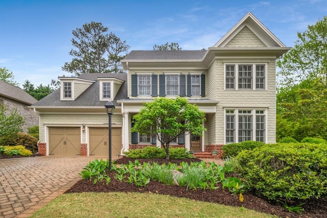 201 Hunley Ct, Alpharetta, GA 30005 - traditional-style home featuring an attached garage, a shingled roof, driveway, and brick siding